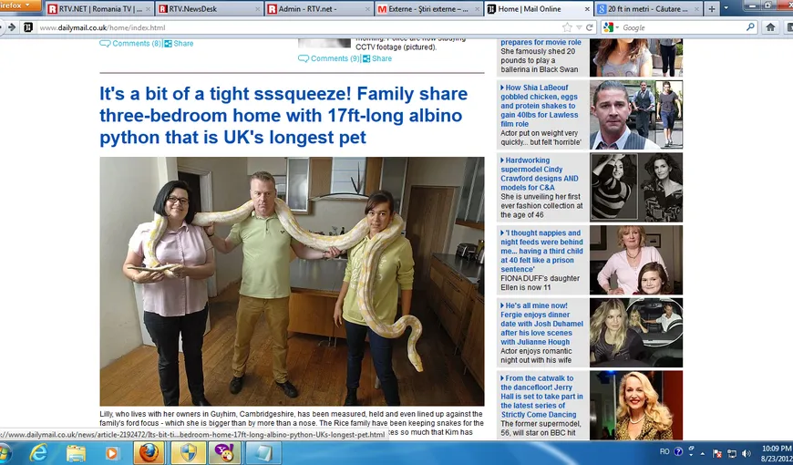 O familie din Marea Britanie împarte locuinţa cu un piton albinos de 5.18 metri