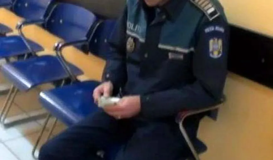 Poliţist timişean, „săltat” de DGA în timp ce înapoia 1.000 de euro primiţi ca şpagă