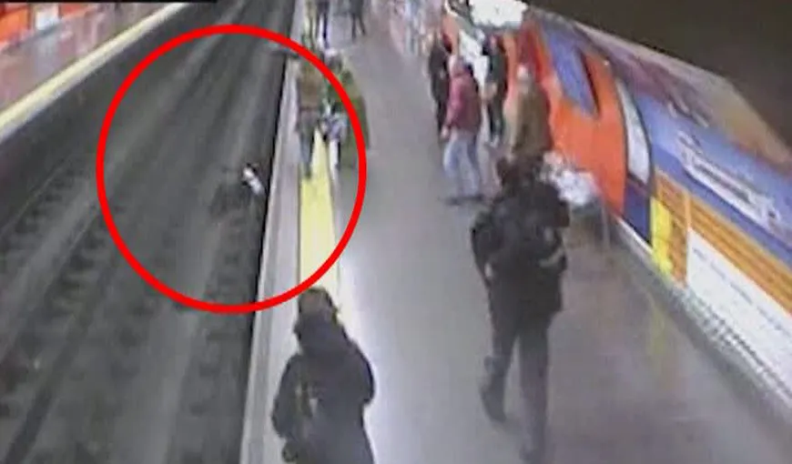 Scene incredibile la metroul din Madrid: O femeie a leşinat şi a ajuns pe şinele metroului VIDEO