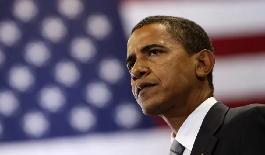 FOTOGRAFIE CONTROVERSATĂ: Barack Obama, surprins în timp ce trage cu puşca