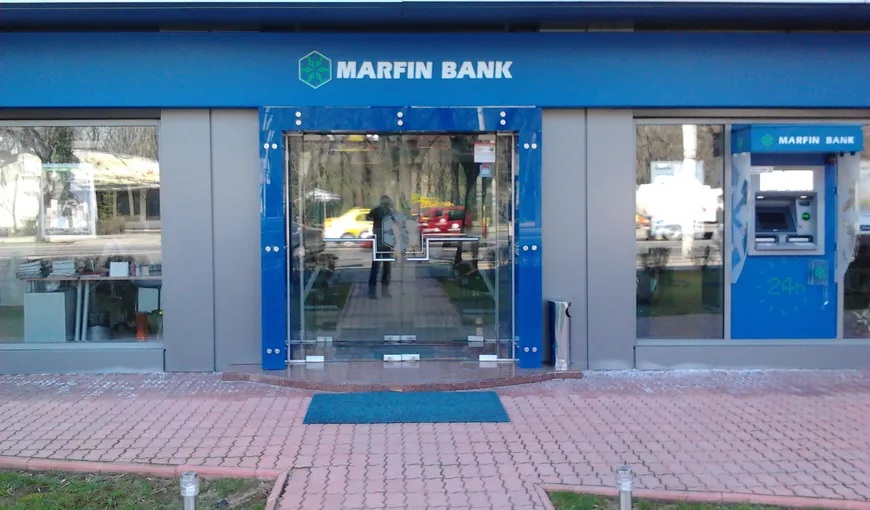 Clienţii de la Bank of Cyprus îşi pot ridica banii începând de luni de la Marfin Bank
