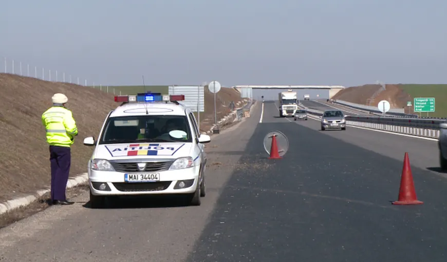 Un drum din Sibiu a fost blocat cu două TIR-uri pentru prinderea unui hoţ de maşini