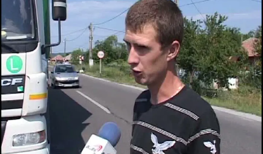 Scandal în Gorj. Un şofer de tir acuză că a fost bătut de un poliţist VIDEO