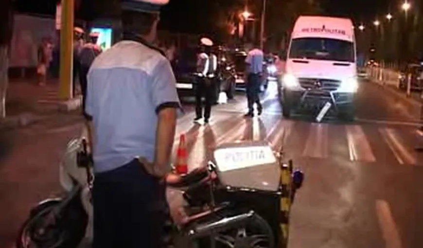 Accident grav în Capitală. Un poliţist a fost lovit de un microbuz