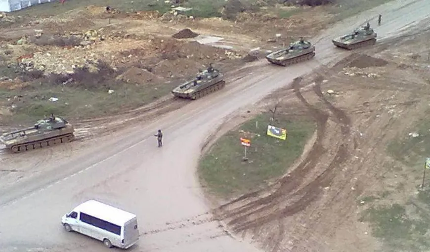 ALERTĂ în Crimeea: Trupele ruseşti au înconjurat o bază aeriană şi au dat un ultimatum forţelor din interior