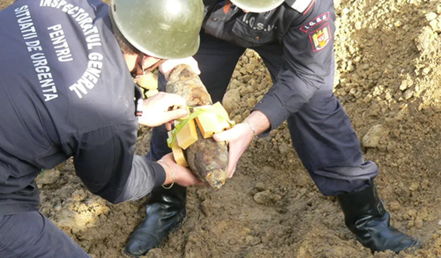 Un proiectil exploziv, găsit într-o groapă făcută pentru înhumarea unei persoane decedate