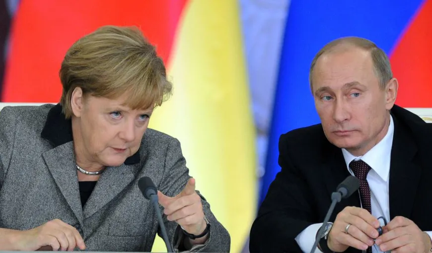 Putin şi Merkel vor organizarea unei noi reuniuni a Grupului de contact pentru Ucraina
