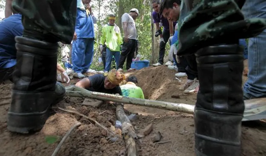 139 de cadavre, descoperite în tabere folosite pentru trafic cu fiinţe umane, în Malaezia