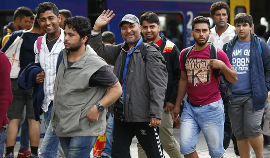 CRIZA IMIGRANŢILOR. Mii de refugiați au fost primiți cu căldură în Germania