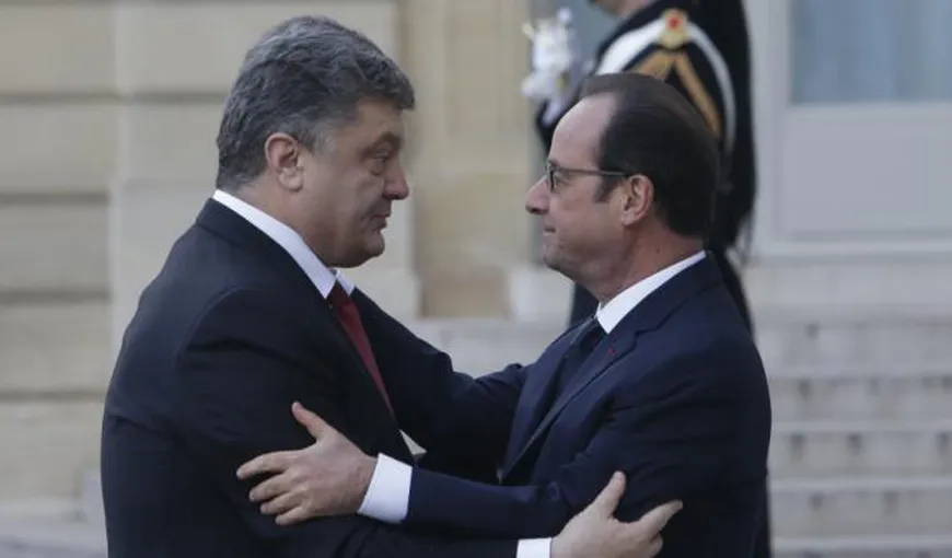 Confruntări în faţa Parlamentului de la Kiev. Hollande se solidarizează cu Poroşenko