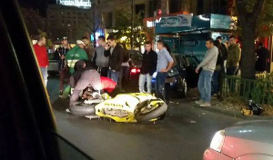 Accident TERIBIL în centrul Capitalei. O motociclistă, lovită în plin de o masină