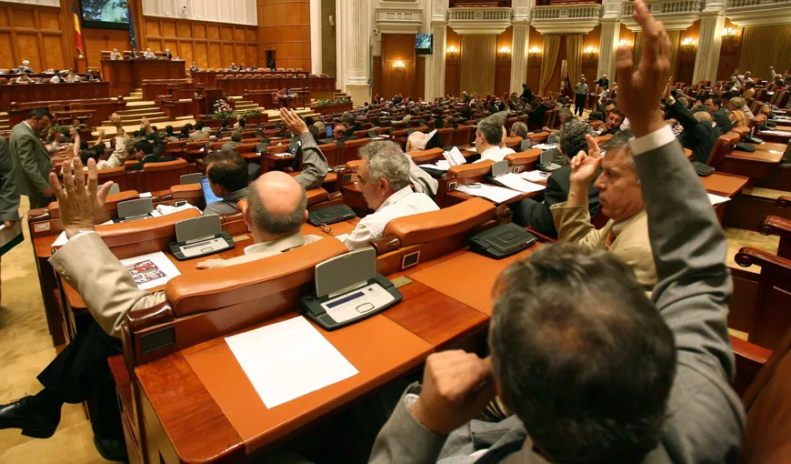 Deputaţii au adoptat Legea dării în plată cu majoritatea voturilor