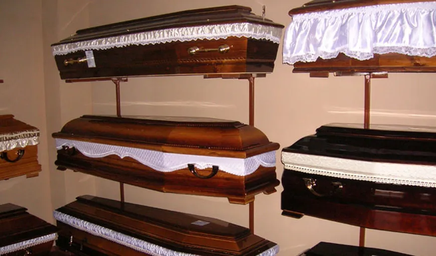 PROIECT. Morţii ar putea fi înmormântaţi cu brăţări de identificare ale firmei de pompe funebre