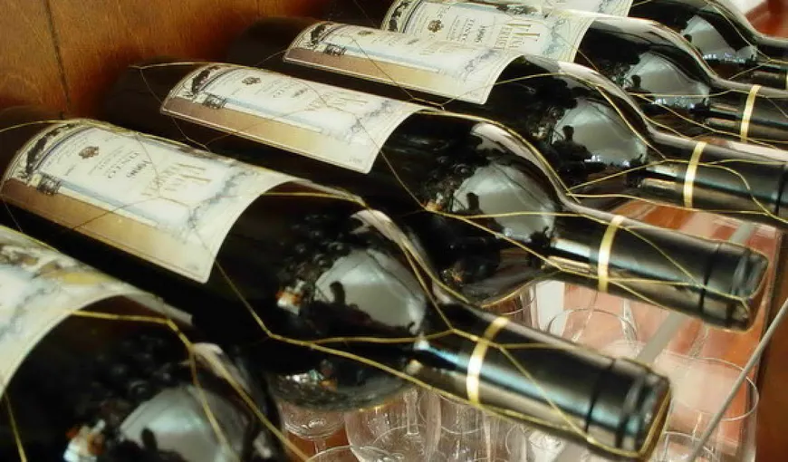 Sechestru pe 8.000 de sticle de vin ce aparţin unui avocat acuzat de evaziune fiscală cu un prejudiciu de 3 milioane euro