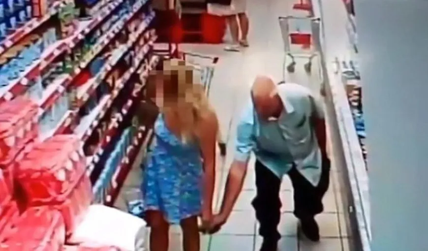 Bărbat surprins în timp ce făcea poze pe sub rochiile femeilor, într-un supermarket. Ce a păţit voaiorul FOTO