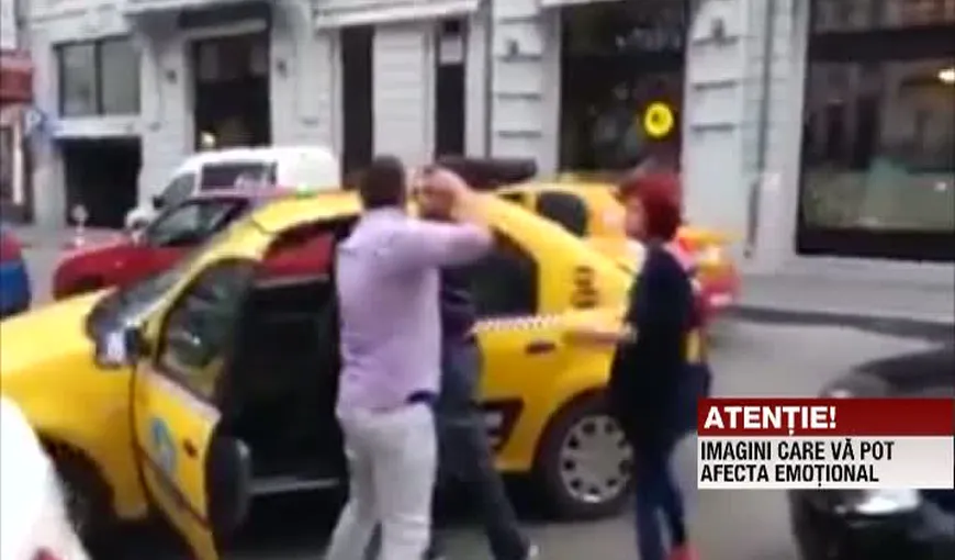 IMAGINI INCREDIBILE, surprinse în Capitală. Un taximetrist, bătut în plină stradă VIDEO