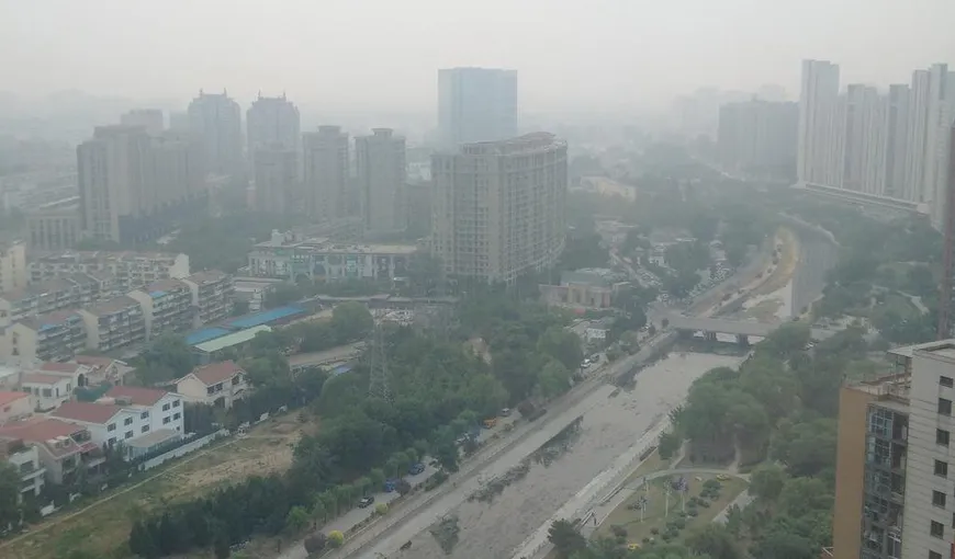Cod portocaliu de poluare în capitala Chinei, până la sfârşitul săptămânii. Sunt aplicate mai multe restricţii