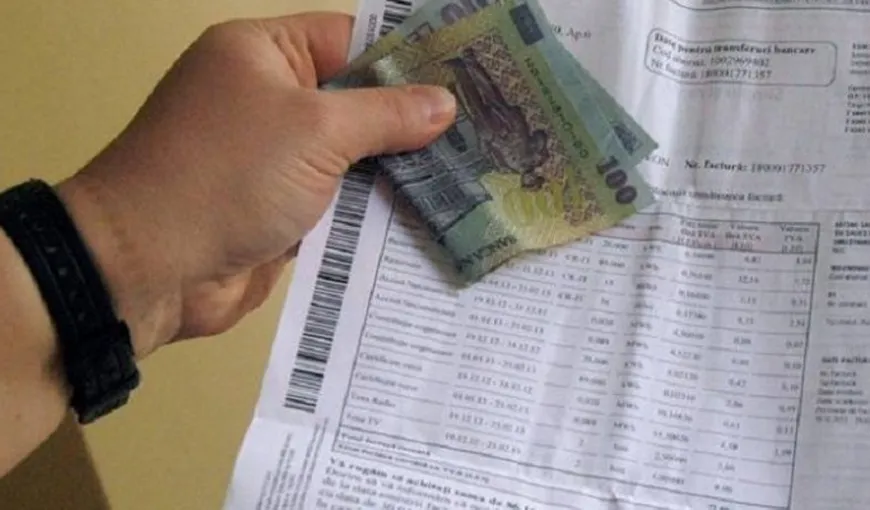 Un sfert dintre români se împrumută pentru a-şi plăti facturile