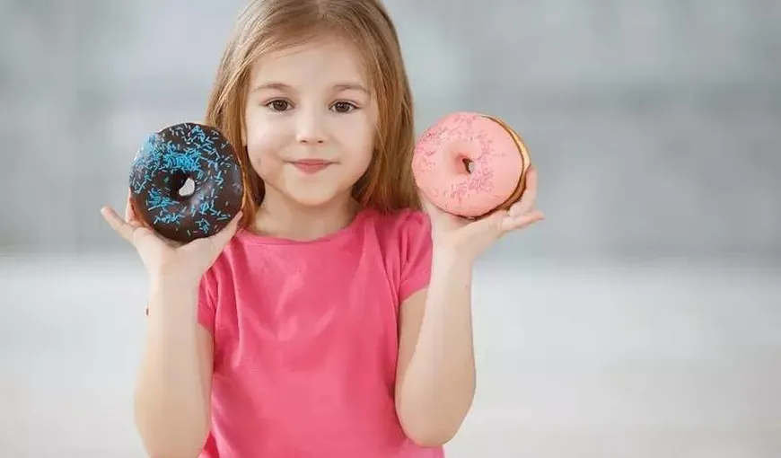 CNA interzice copiii în reclamele cu alimente