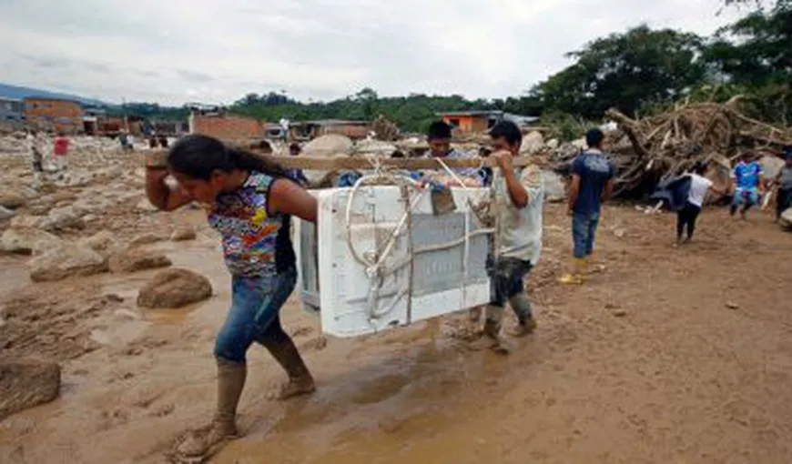 Opt persoane au murit şi alte 20 au fost date dispărute în urma ploilor torenţiale care au lovit Columbia