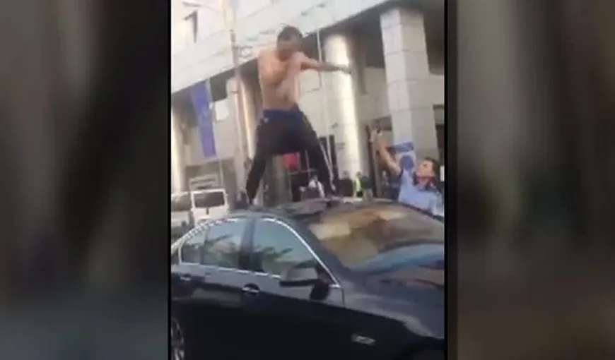 Incident uluitor în plină stradă, bărbat încătuşat de poliţişti VIDEO