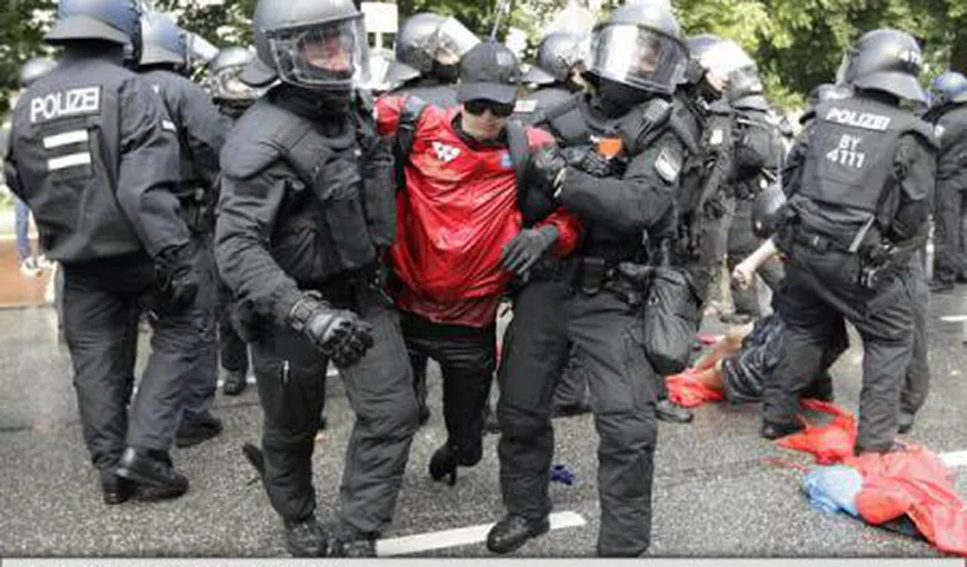 G20: Noi ciocniri între manifestanţi şi poliţie înaintea summitului: mai multe maşini incendiate
