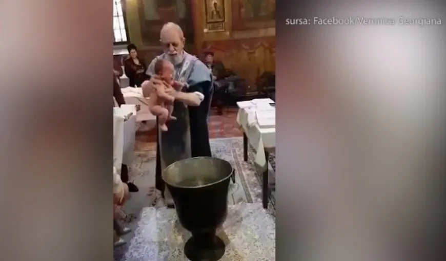 Anchetă după ce un preot a fost filmat bruscând un copil în timpul slujbei de botez