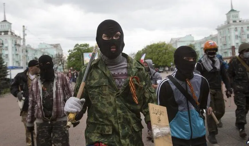 Situaţie tensiontă în Lugansk, unde bărbaţi înarmaţi au ocupat centrul oraşului