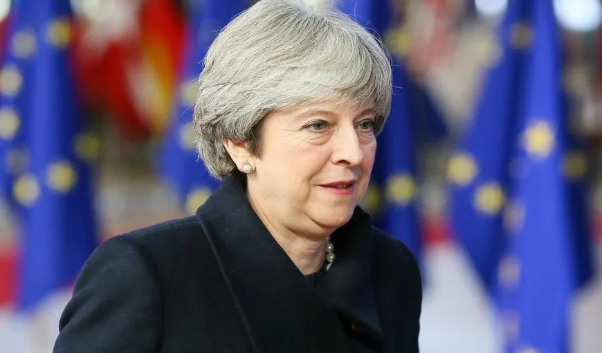 Theresa May îi ia apărarea Poloniei care a fost criticată de UE din cauza reformei din sistemul judiciar