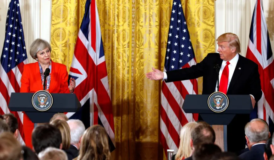 Theresa May îi cere lui Donald Trump să nu declanşeze RĂZBOIUL