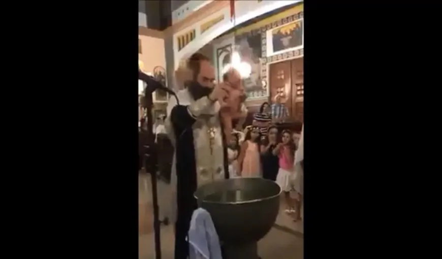 Bebeluş bruscat de preot la botez. Poliţia s-a autosesizat în acest caz VIDEO