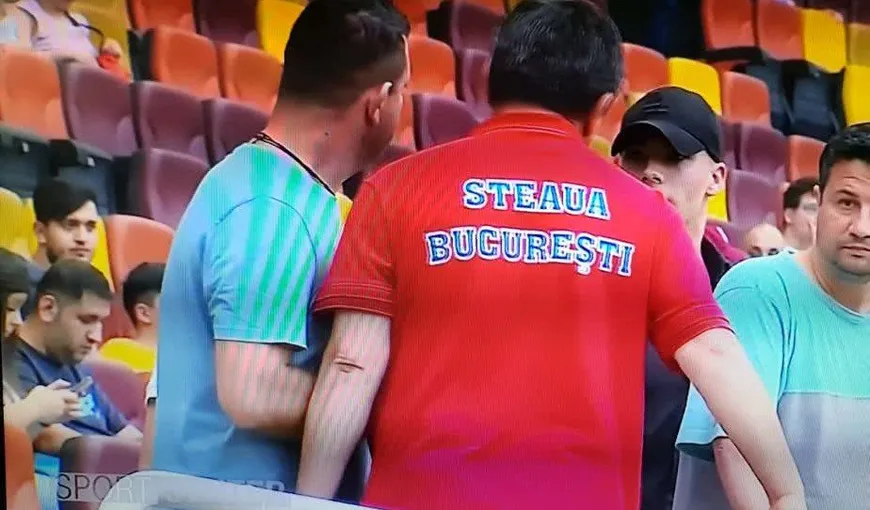 SCENE ŞOCANTE pe Arena Naţională. Lăcătuş a urcat în tribună şi a bruscat un suporter înainte de Rapid-Steaua VIDEO