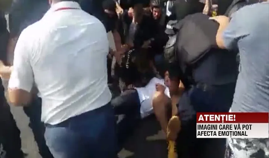 Parlamentar român, bătut şi pus la pământ de mascaţi în Chişinău