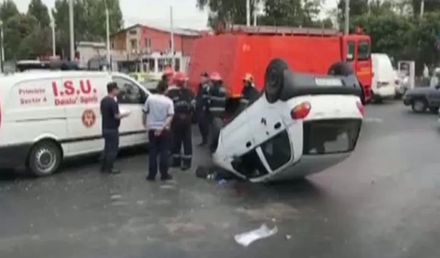 Accident grav în Bucureşti: o maşină s-a răsturnat  pe Bd. Alexandru Obregia