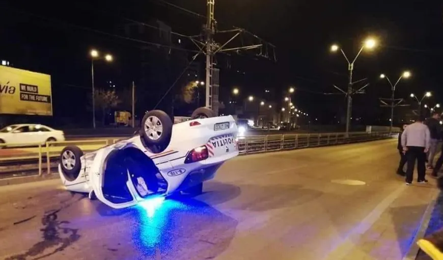 Accident spectaculos în BUCUREŞTI. Doi poliţişti, RĂNIŢI după ce un autoturism a lovit maşina în care se aflau