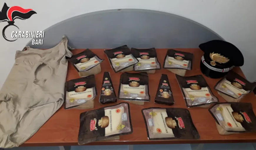Un român a fost arestat în Italia pentru că a furat 13 calupuri de brânză dintr-un supermarket