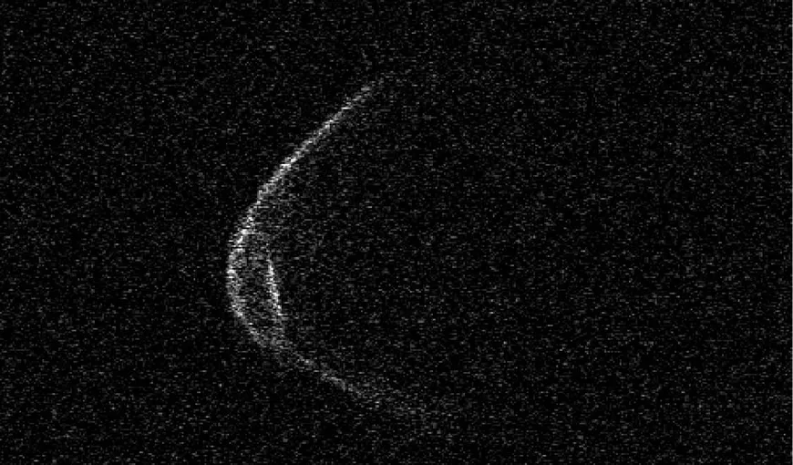 Un asteroid gigantic va trece, miercuri, pe lângă Pământ. În imaginea surprinsă de astronomi, corpul ceresc pare să poarte mască