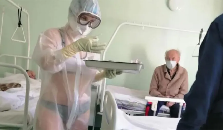 Asistentă medicală tratează pacienţii cu COVID 19 în lenjerie intimă. Nu este fantezie, se întâmplă în Rusia