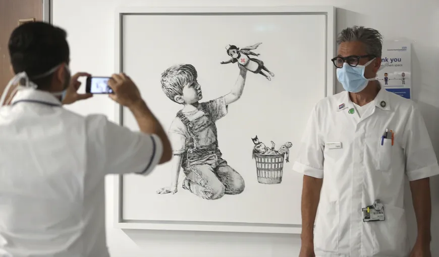 Un hoţ a încercat să fure un tablou de Banksy în valoare de 6 milioane de dolari îmbrăcat în combinezon anti-COVID 19