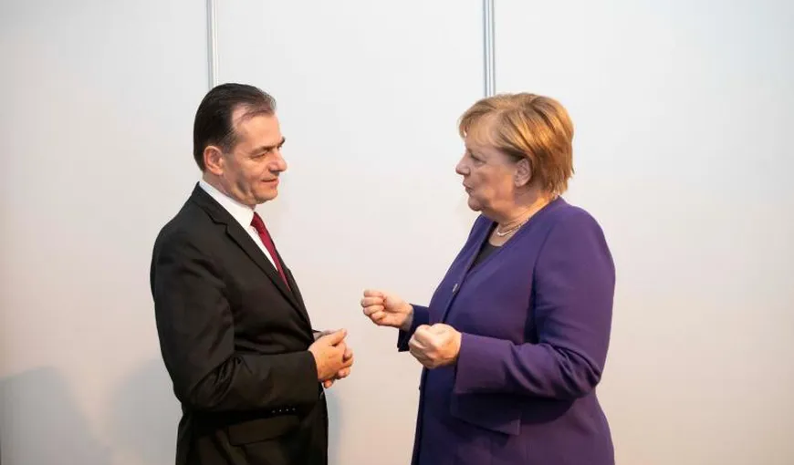 Ludovic Orban a discutat cu Angela Merkel la telefon, la iniţiativa ei. Românii plecaţi la cules de sparanghel, printre temele abordate