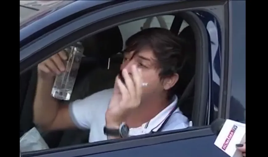 Scandal în Capitală! Un cetăţean, prins că folosea telefonul la volan, nu a vrut să-şi recunoască fapta VIDEO