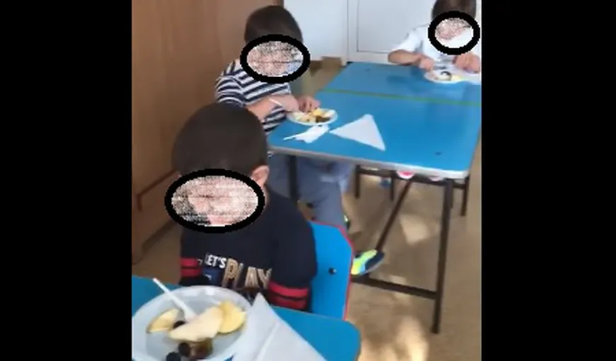 Imagini scandaloase. O educatoare s-a filmat când loveşte un copil la grădiniţă pe motiv că nu taie fructe pe farfurie