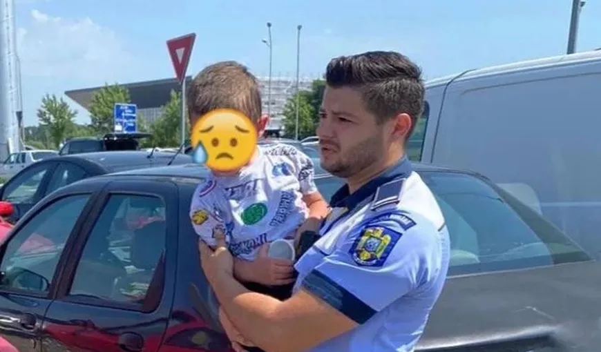Intervenţie de urgenţă într-o parcare din Oradea, după ce un copilaş a rămas blocat într-o maşină. Echipajul de poliţie a intervenit exemplar: A reușit să îl forțeze!