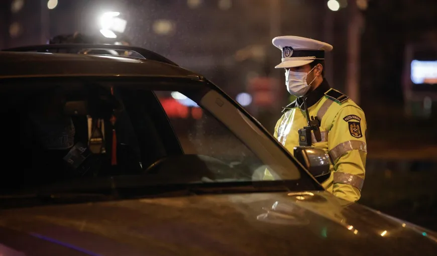 Scandal violent în Capitală între un polițist și un șofer! Oamenii legii i-au spart geamul și l-au imobilizat