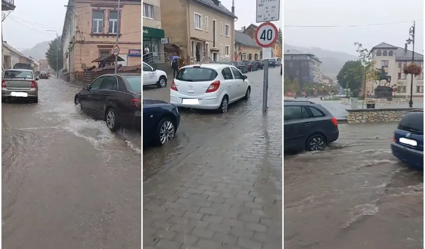 VIDEO Străzi inundate în judeţul Alba, după o ploaie torenţială. Apa a trecut în unele zone de jumătate de metru