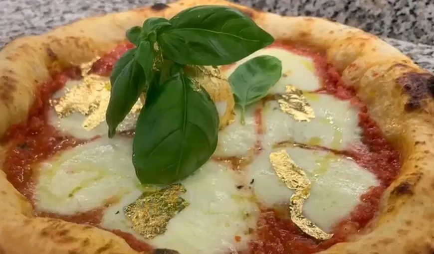 Prima pizza cu foiţă de aur în Italia, făcută de un român. Cât costă şi ce ingrediente conţine