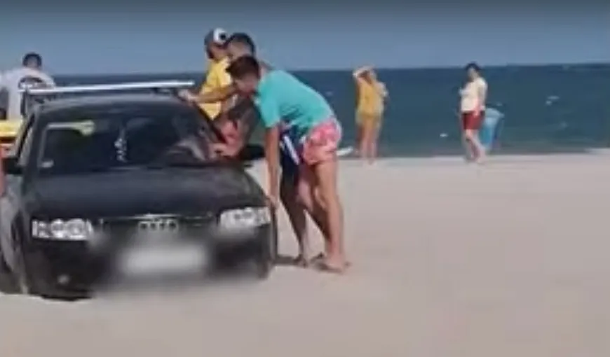 VIDEO | Haos la Marea Neagră: „cocalarul cu Audi” a rămas blocat în nisip