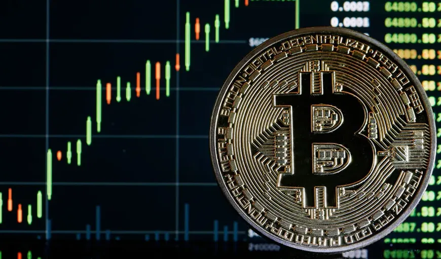 Bitcoin a atins pe cea mai mare valoare din 2021 până în prezent! Moneda a depășit 60.000 de dolari și se apropie de recordul absolut